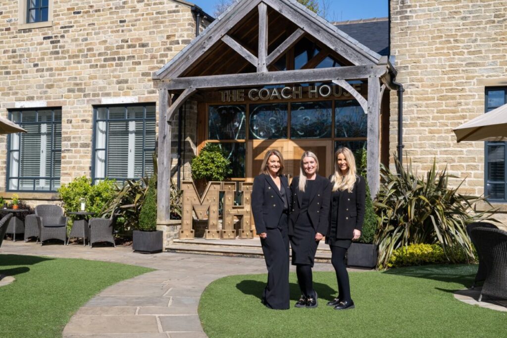 Manor House staff outside the Coach House, the wedding venue at Manor House Lindley.