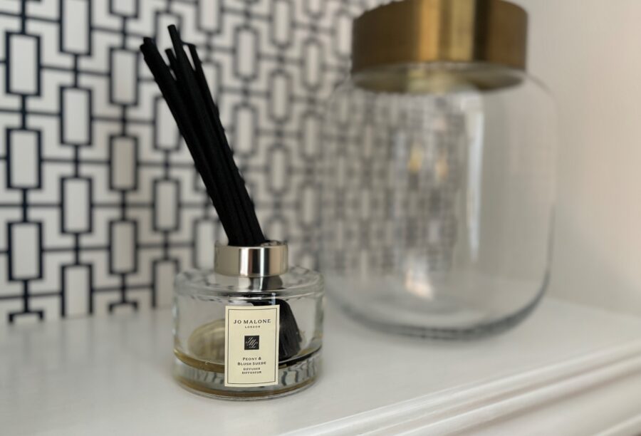 A close-up view of Jo Malone incense sticks on a shelf at Manor House Lindley.