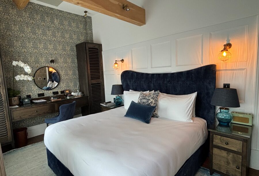 A picture of a king-size bed inside Manor House Lindley.
