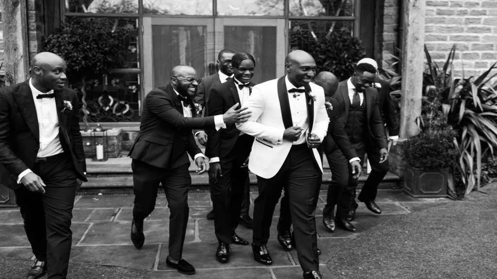 Black and white picture of Groom, Best Man with others at Manor House Lindley