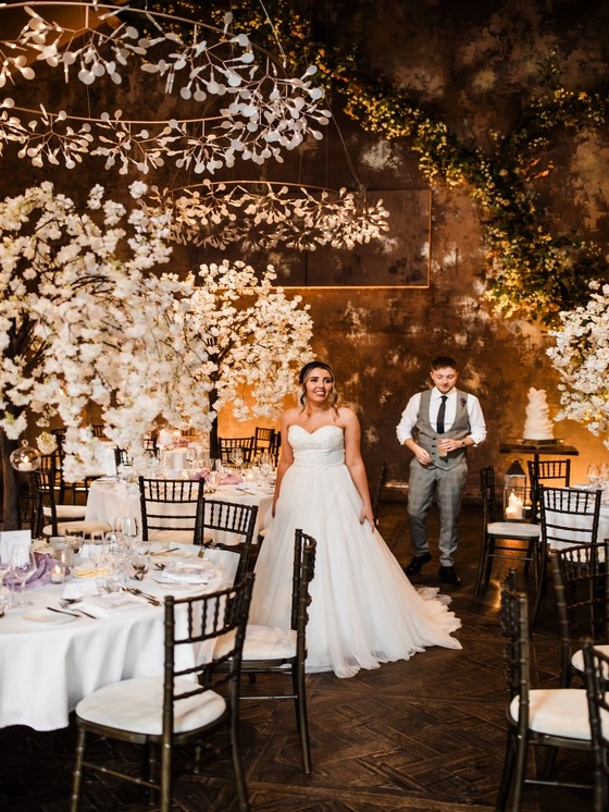 Bride and groom inside the wedding venue at Manor House