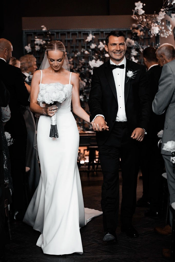 Bride and Groom leaving the Manor House wedding venue