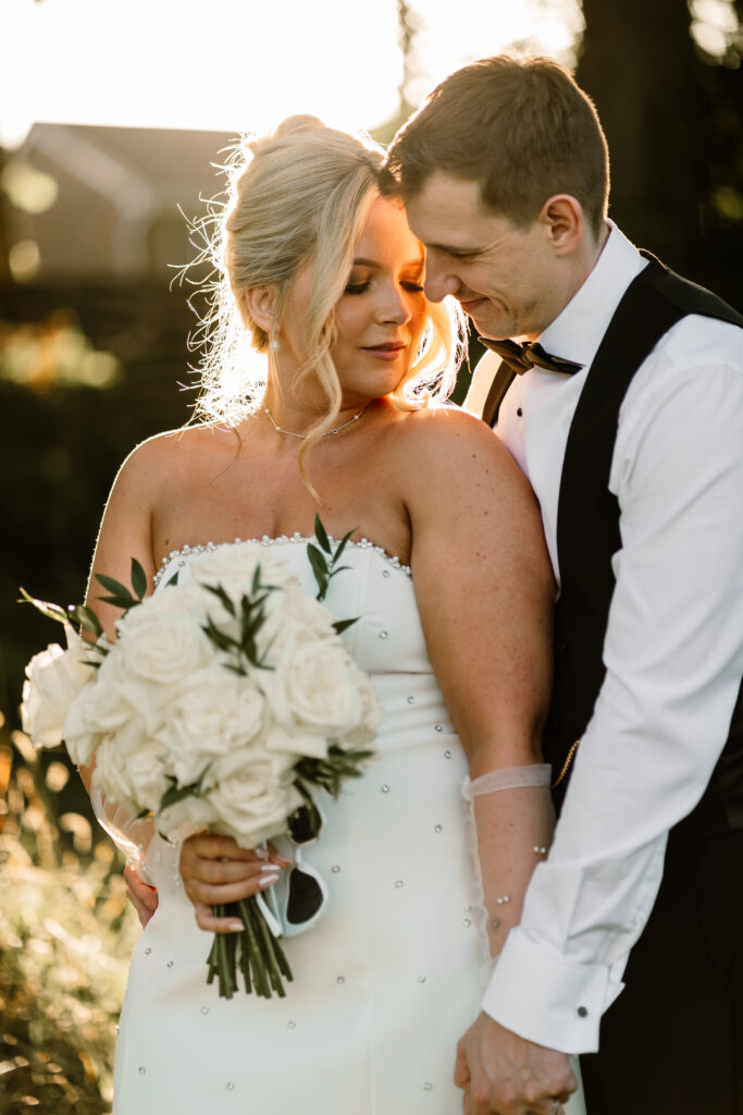 Bride Cara and Groom Shaun outside the ground at Manor House Lindley