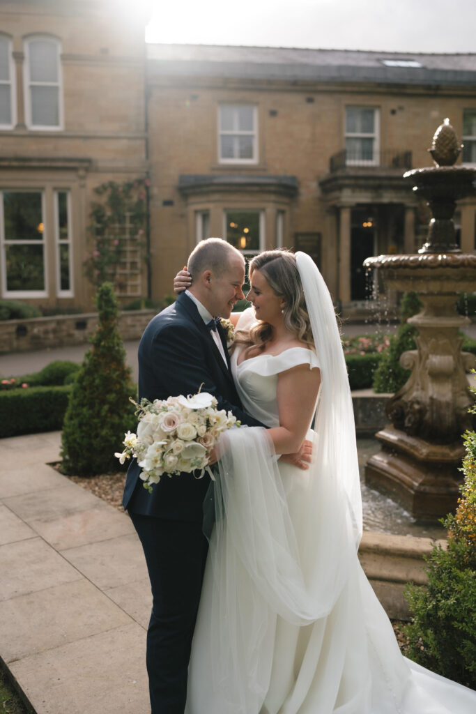 Bride, Libby and groom, outside the grounds at Manor House