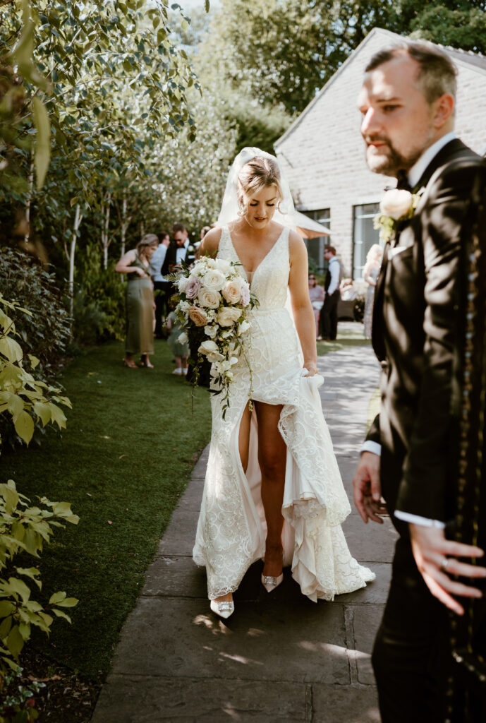 Bride Bonnie and Groom Luke outside Manor House Lindley